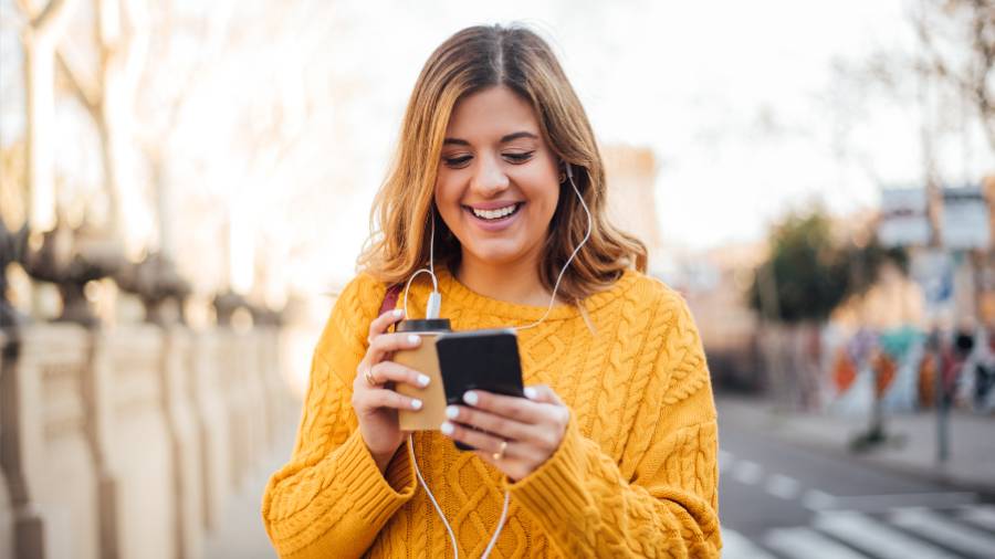 happy looking at phone