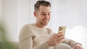 smiling looking at phone